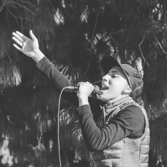 Open-air ministry, mic in hand